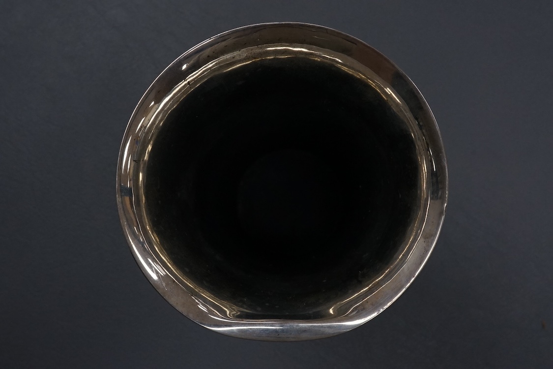 A Georg Jensen sterling 925 beaker, with flared rim and engraved inscription 'The Bookies Cup, 1933' design no.107A, 1925-1932 mark, import marks for George Stockwell, London, 1931, height 13.5cm, 174 grams (a,f,).